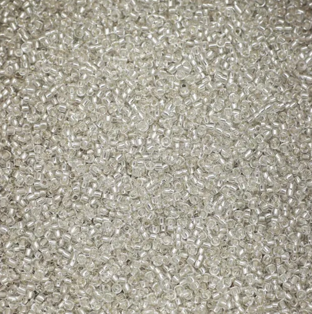 Mostacilla 2mm Translucida - 25gr / Plateado